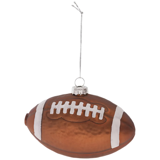 Glass football ornament with a string on a white background