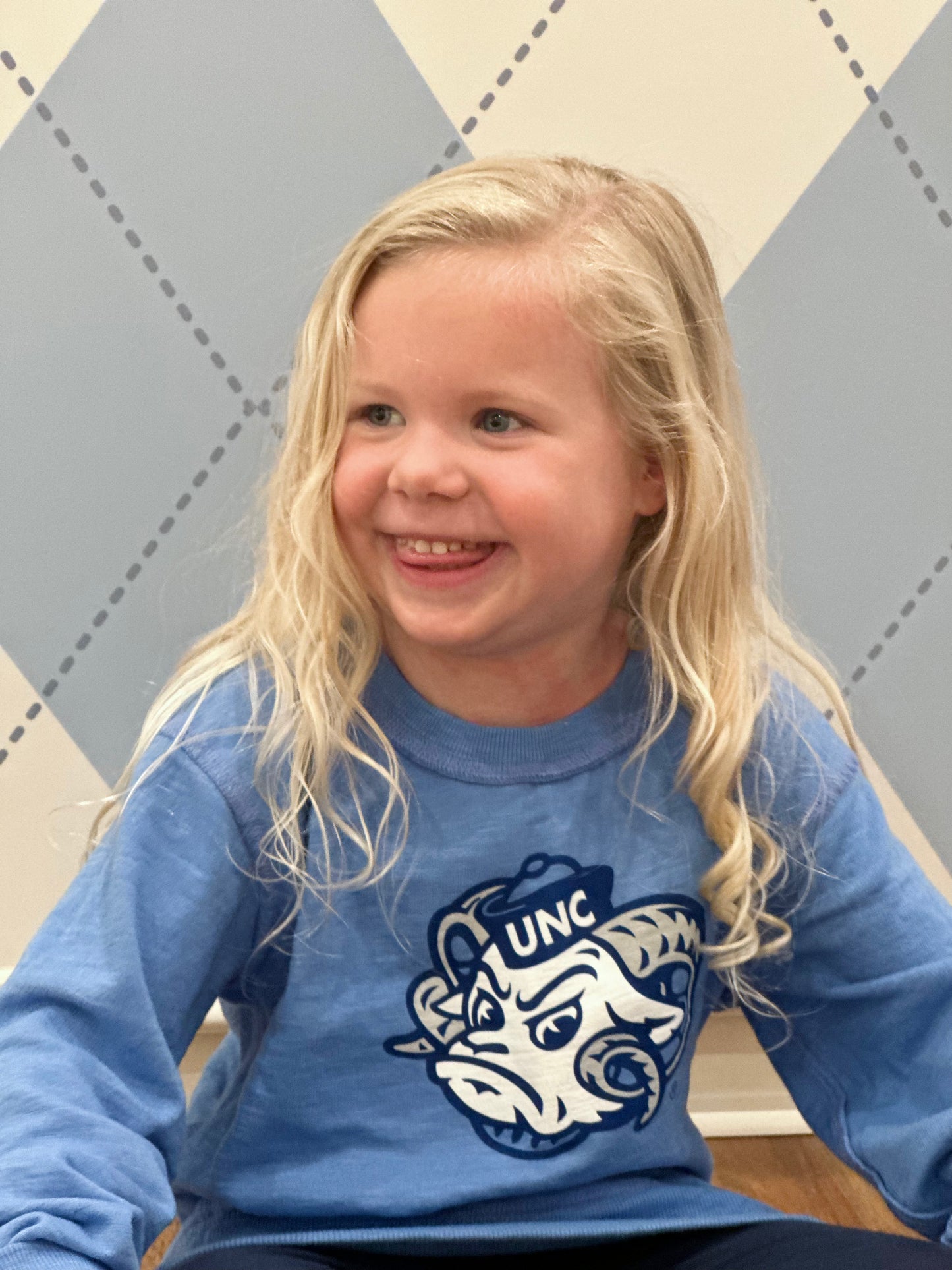 North Carolina Tar Heels Toddler Crewneck Sweatshirt REVERSIBLE in UNC Blue - Lifestyle View - Wes and Willy
