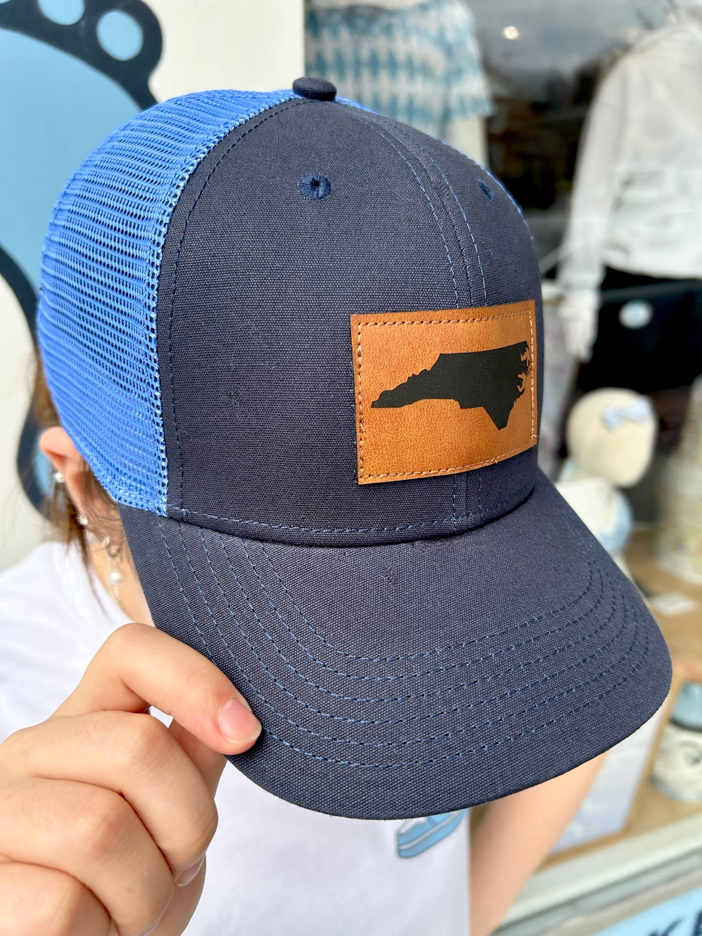 North Carolina Trucker Hat in Navy Blue with Leather NC Patch MPS