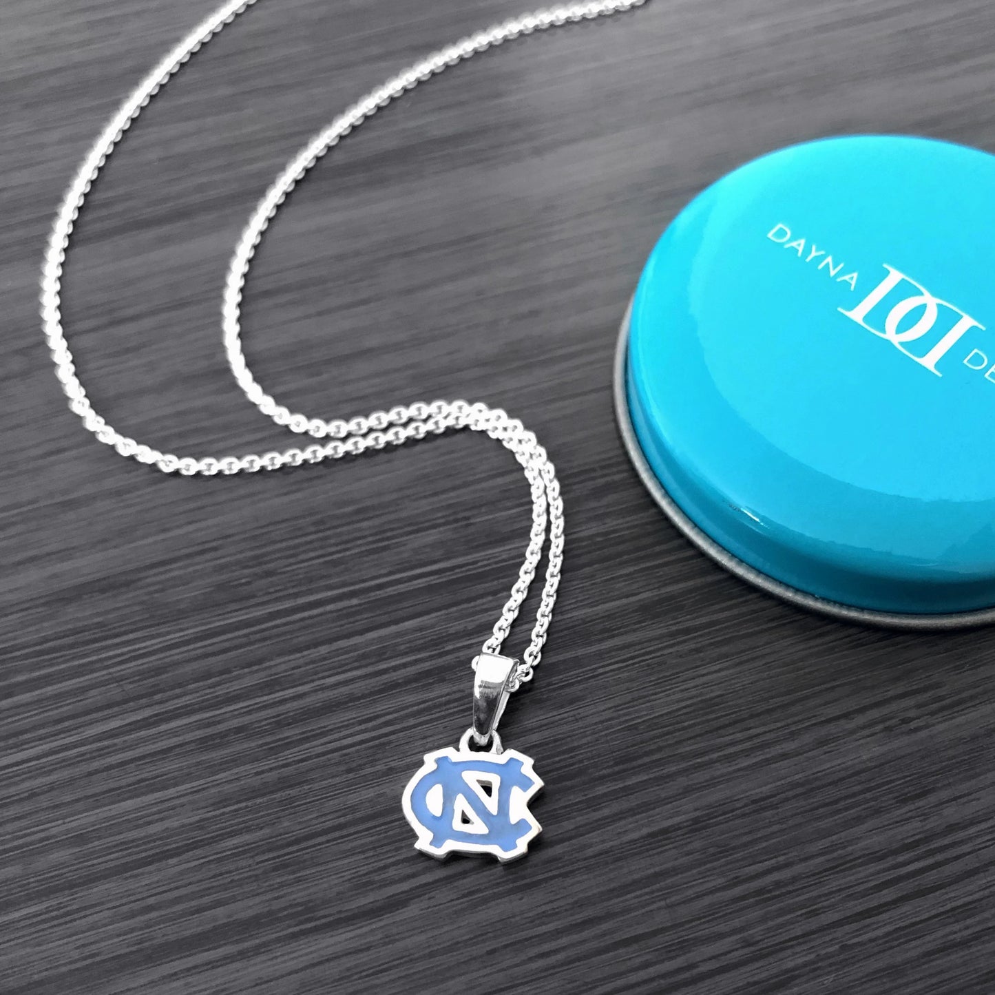 Carolina Tar Heels Interlock Carolina Blue Enamel Pendent Necklace by Dayna Designs