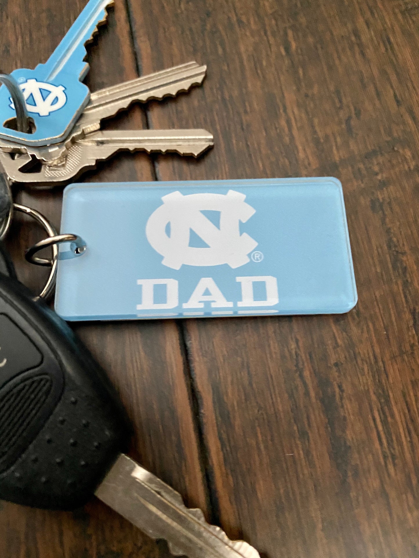 UNC Dad Keychain in Carolina Blue by Wincraft