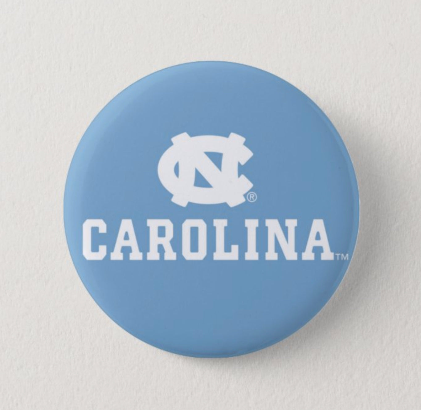 Carolina Logo Button Pin in Light Blue and White