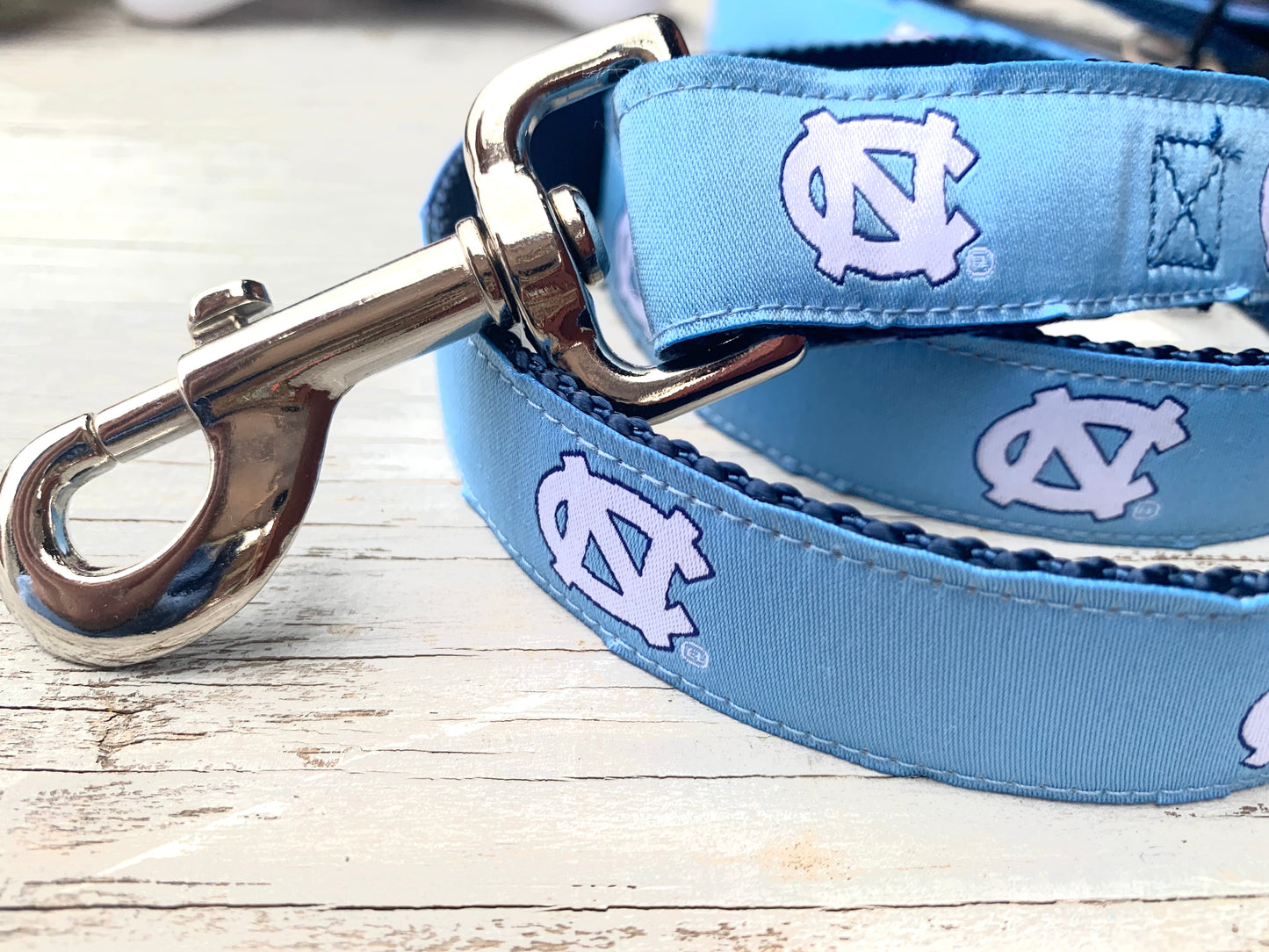 Carolina Blue Dog Leash with White UNC Logos Repeating Down Leash