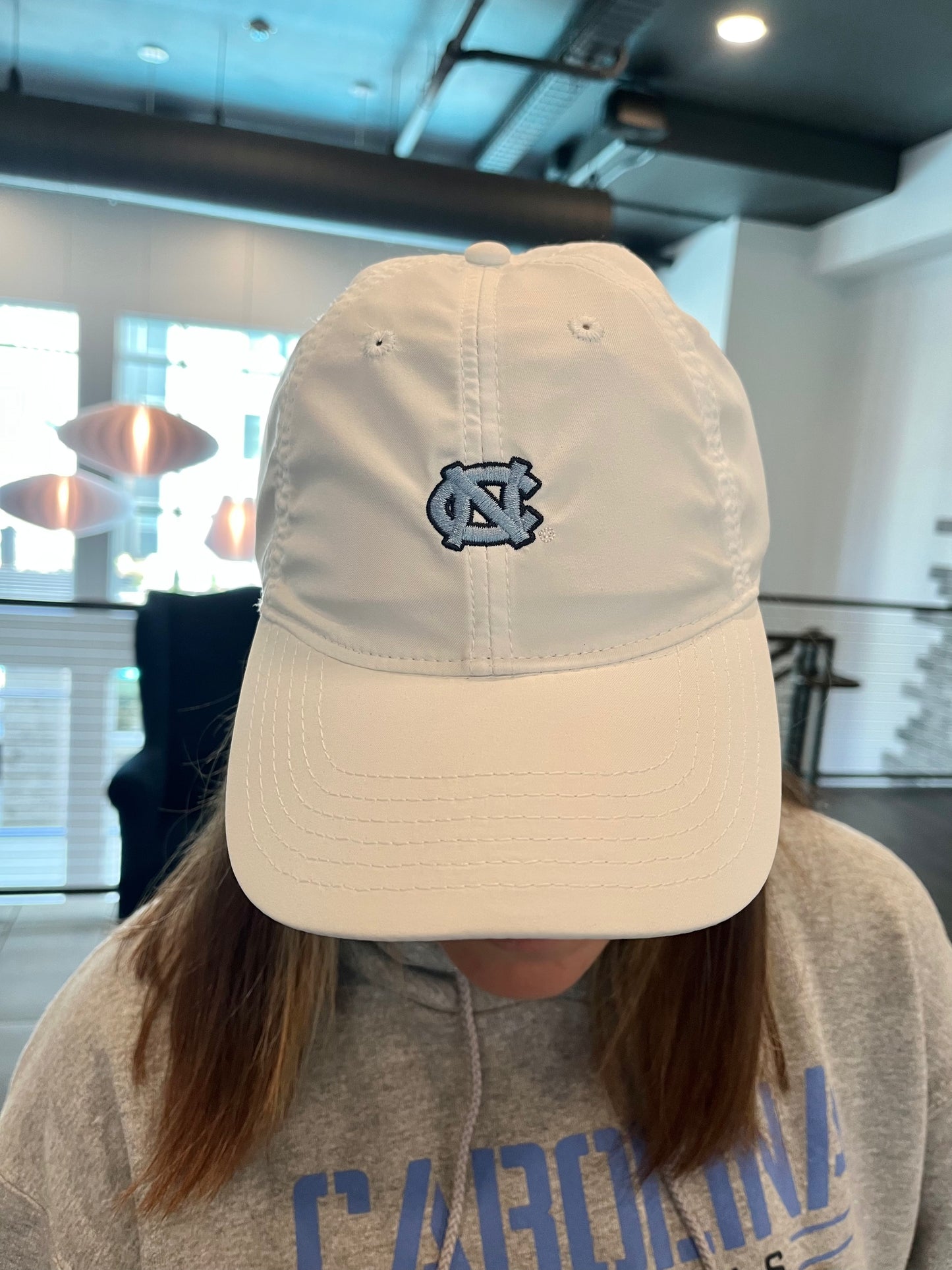 UNC Logo Dry Fit Hat in White with Mini NC Interlock