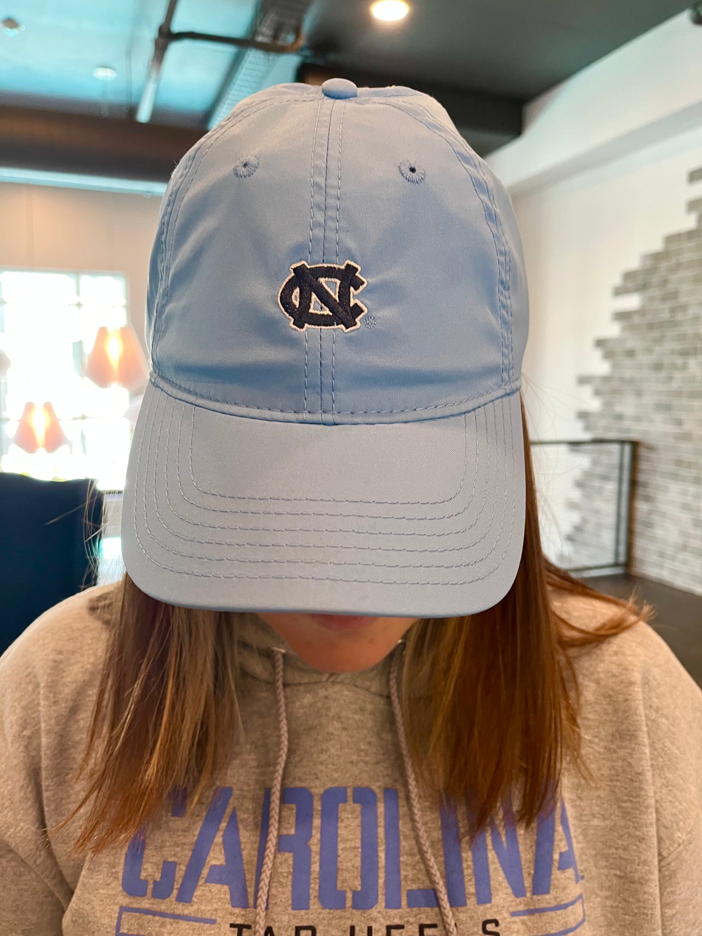 UNC Logo Dry Fit Hat in Carolina Blue with Mini NC Interlock