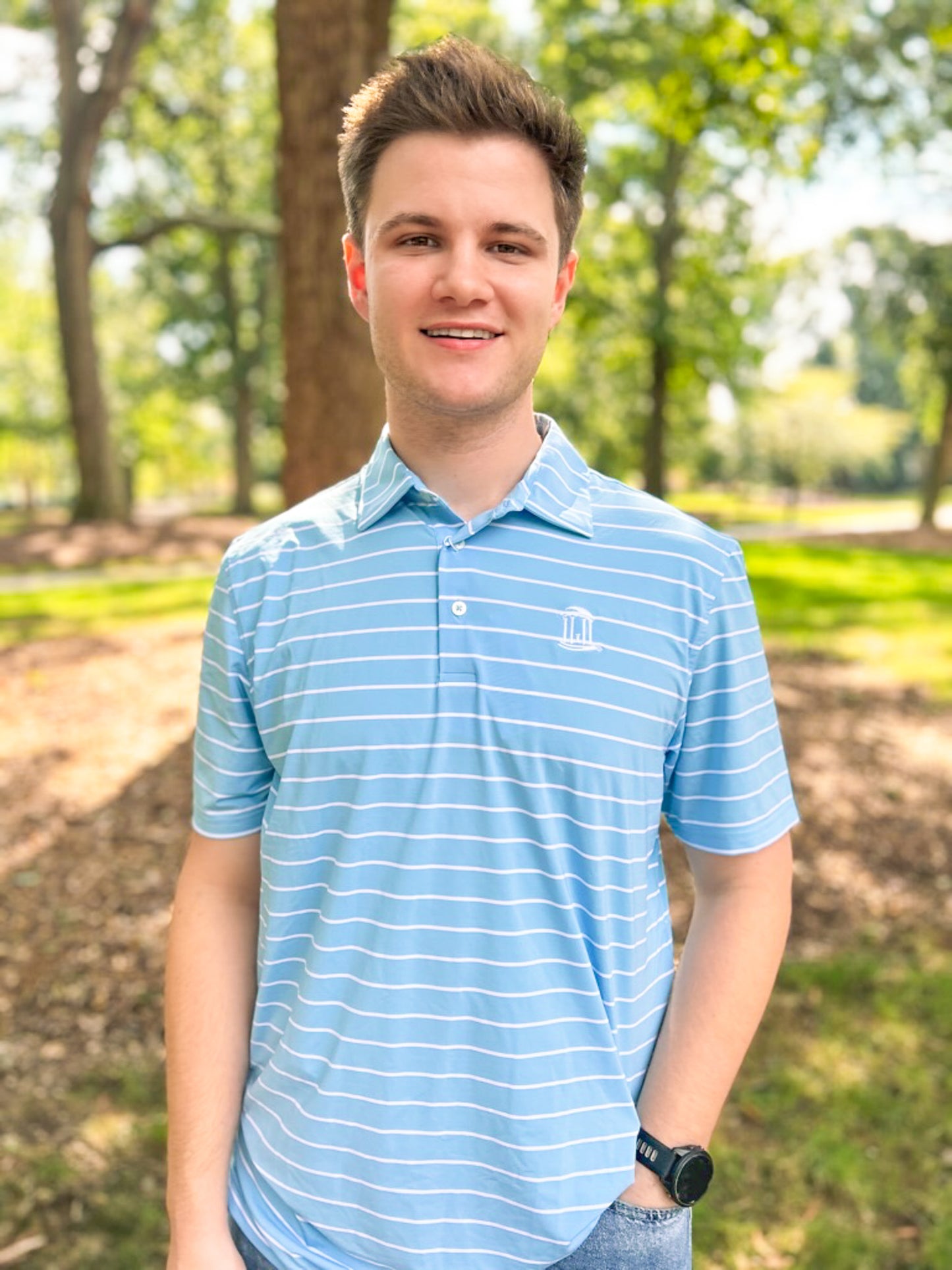 UNC Old Well Men's Shirt by Southern Tide Desmond Stripe Perf Polo