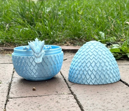 3D Printed Small Light Blue Dragon Egg and Dragon - Lifestyle View - Karma Train 3D Printing