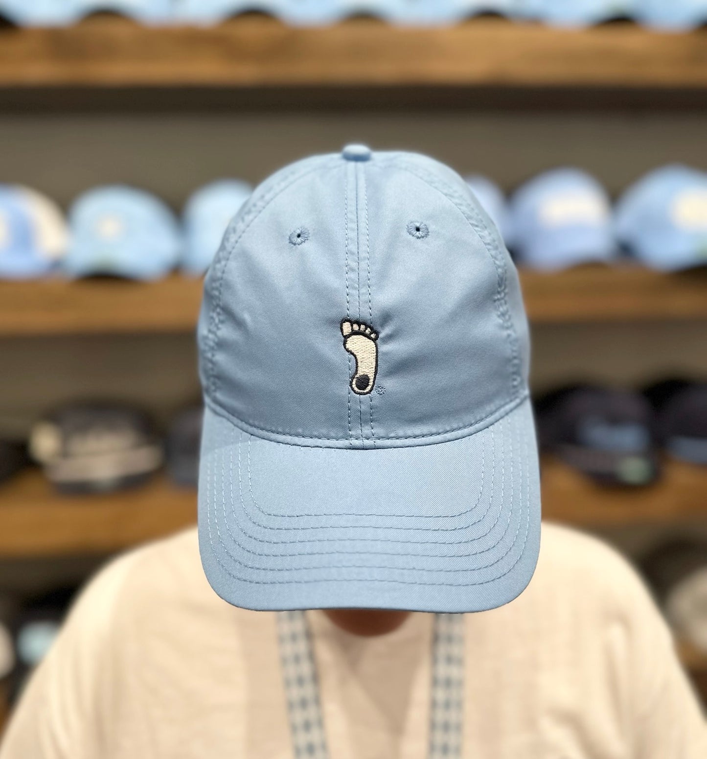 UNC Dry Fit Tar Heel Foot Hat in Carolina Blue by Legacy
