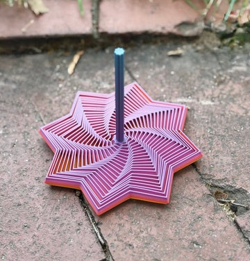 Multi-Color 3D Printed Interlocking Star Spiral Fidget - Detail View - Karma Train 3D Printing