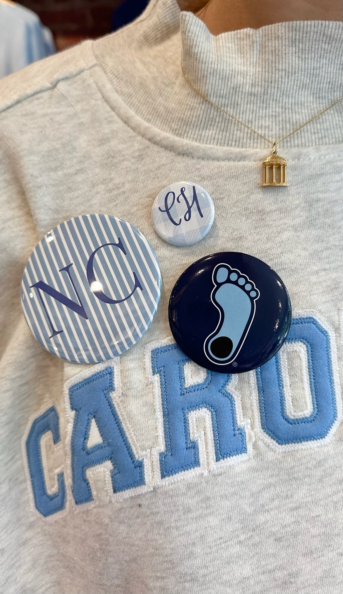 Tar Heels Foot Logo Button Pin in Navy and Carolina Blue