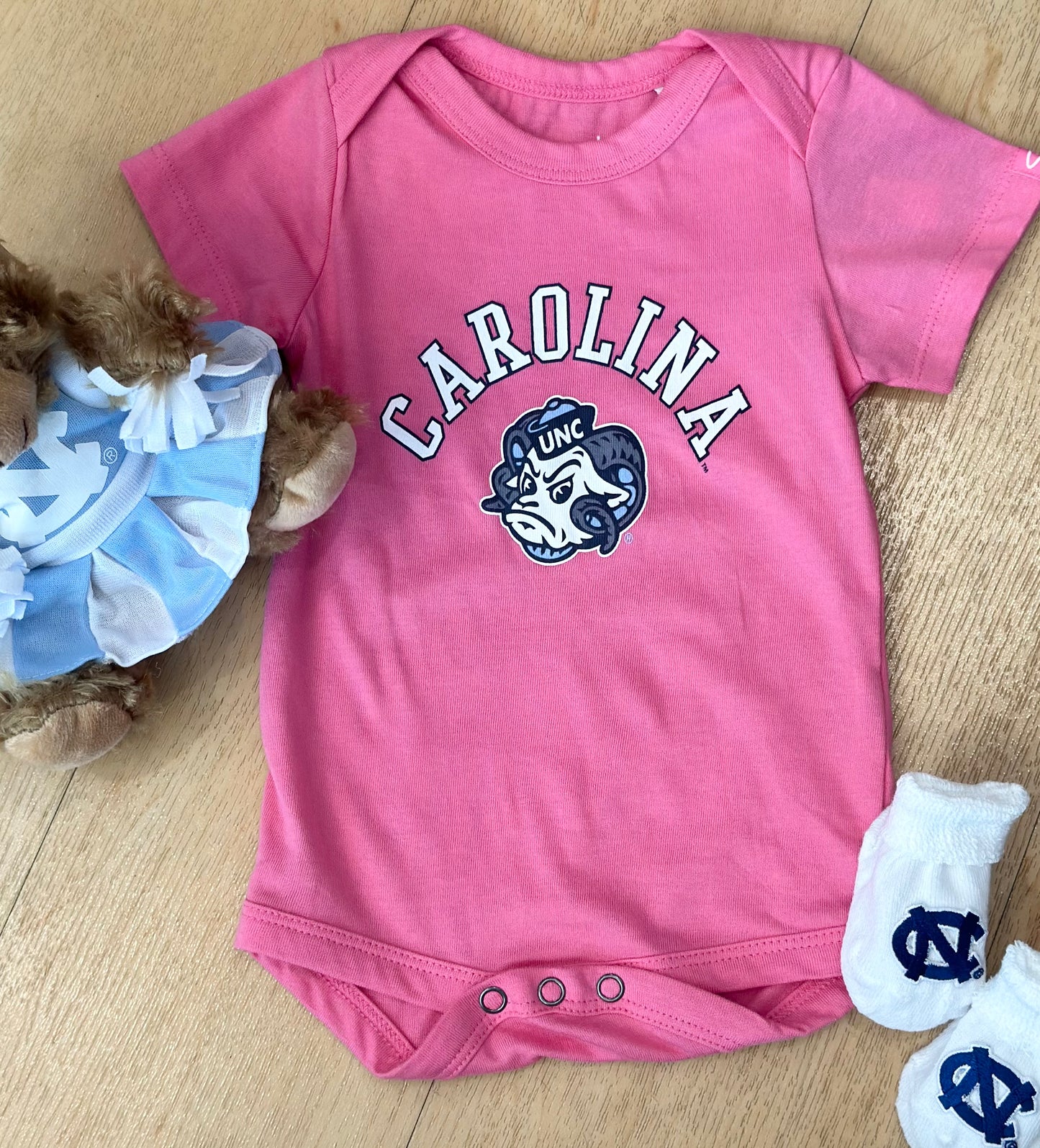 Carolina Tar Heels Otis Onesie in Pink