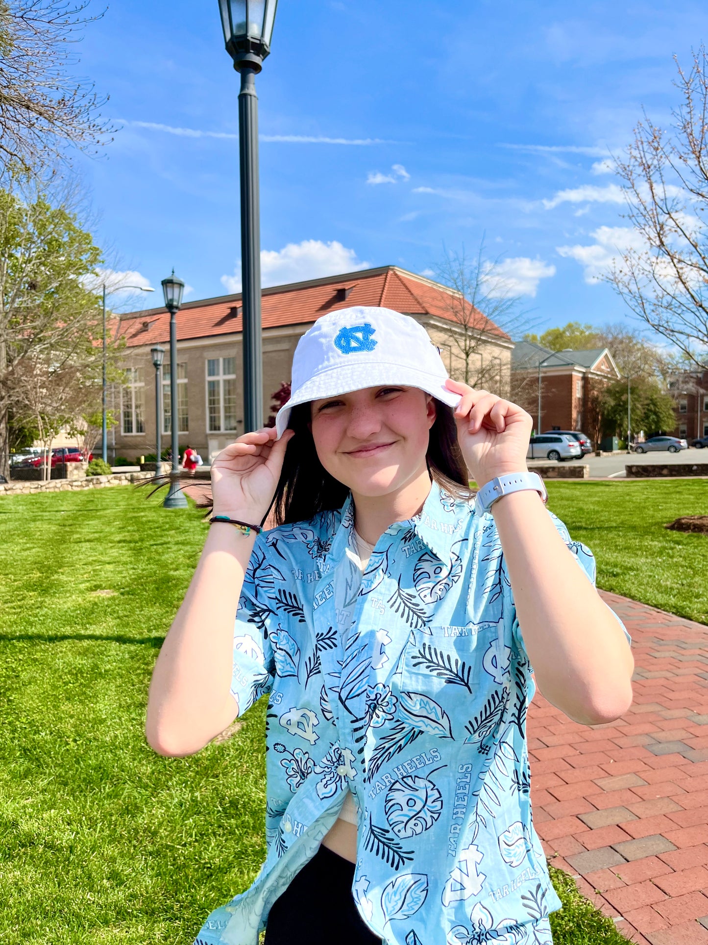 UNC Bucket Hat in White with North Carolina Interlock Logo in Carolina Blue