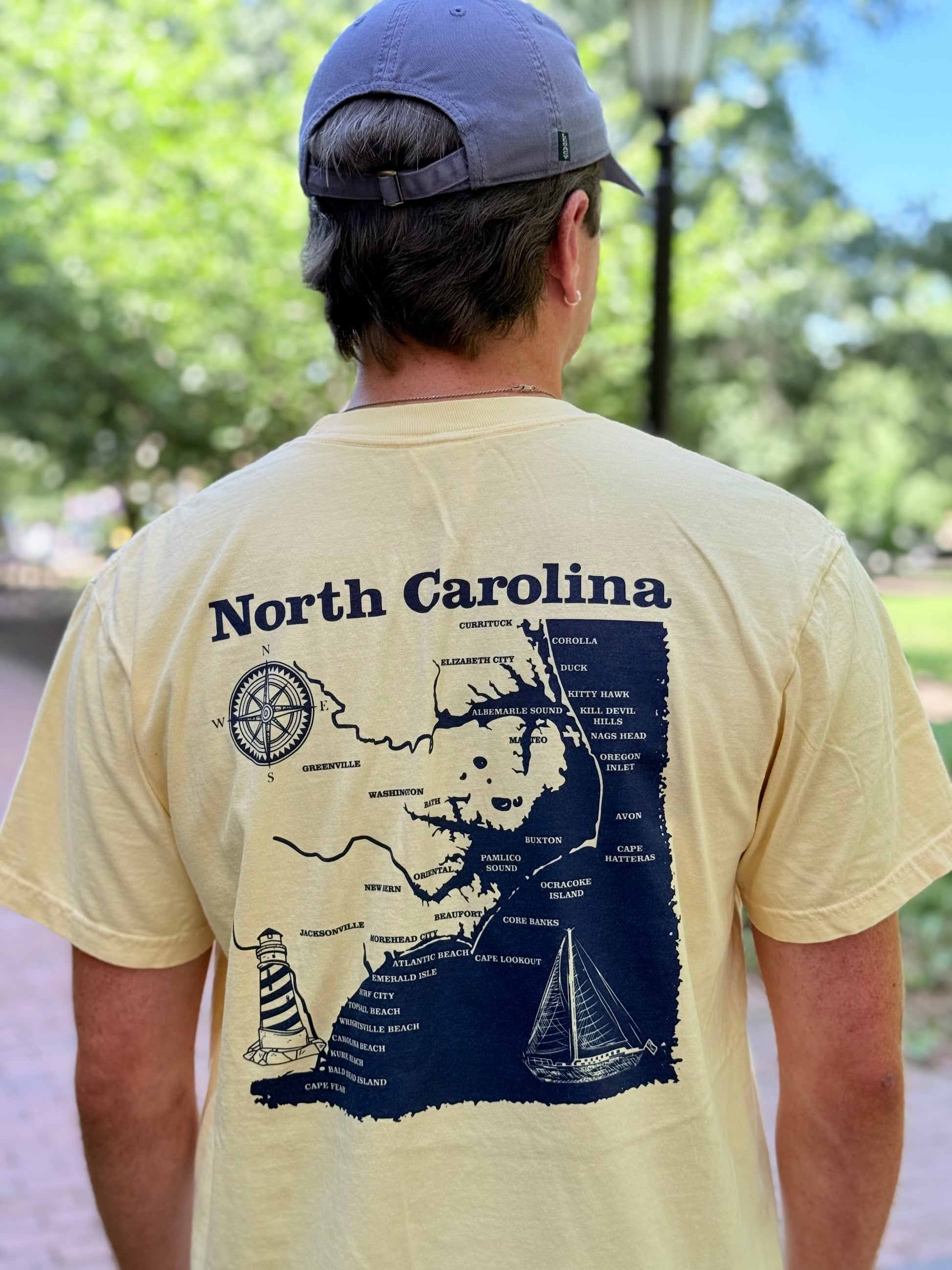 North Carolina State Coastal T-Shirt With Pocket in Butter Yellow - Main View - Shrunken Head
