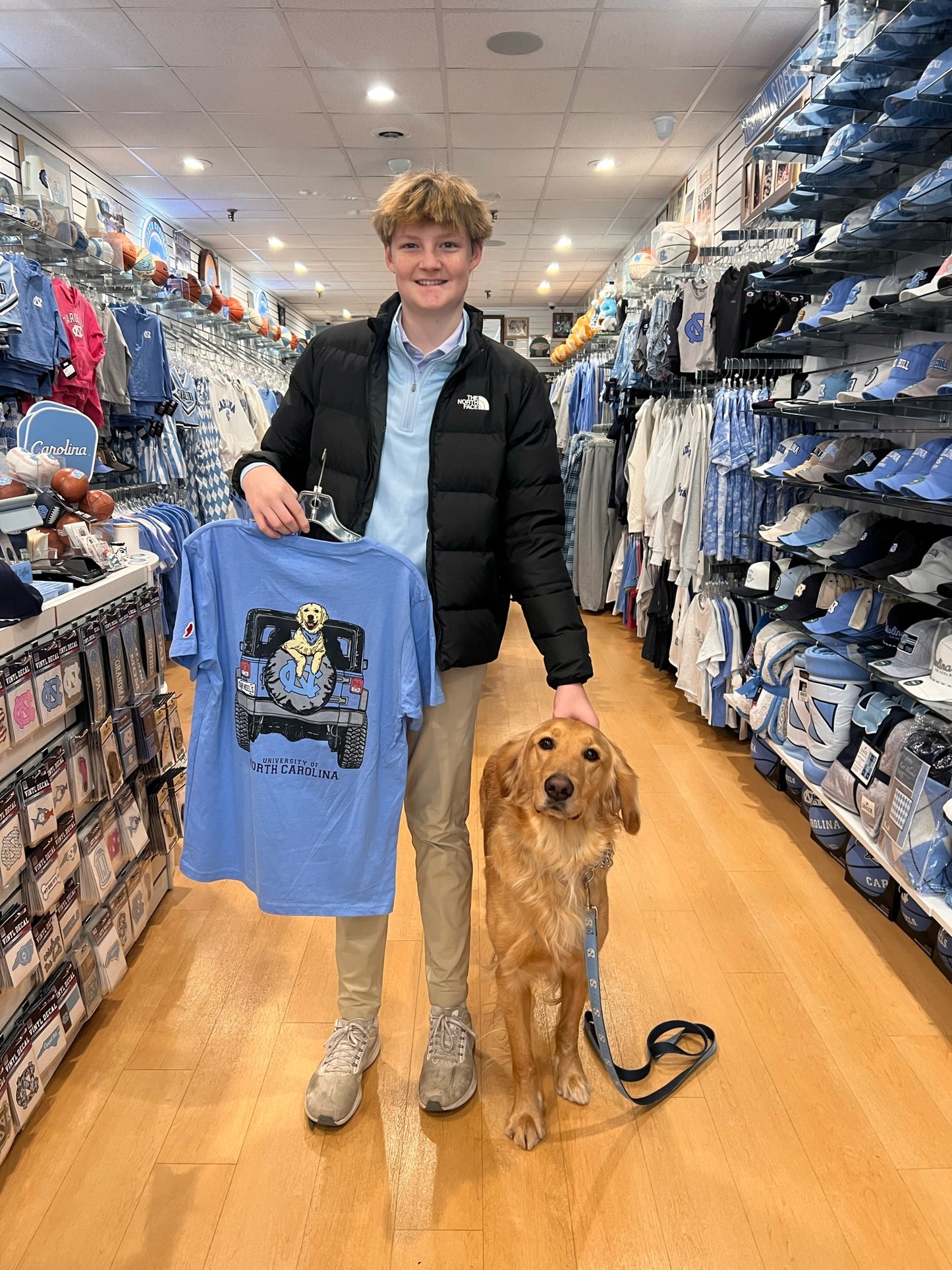 Carolina Blue UNC Dog T-Shirt with Golden Retriever in Jeep