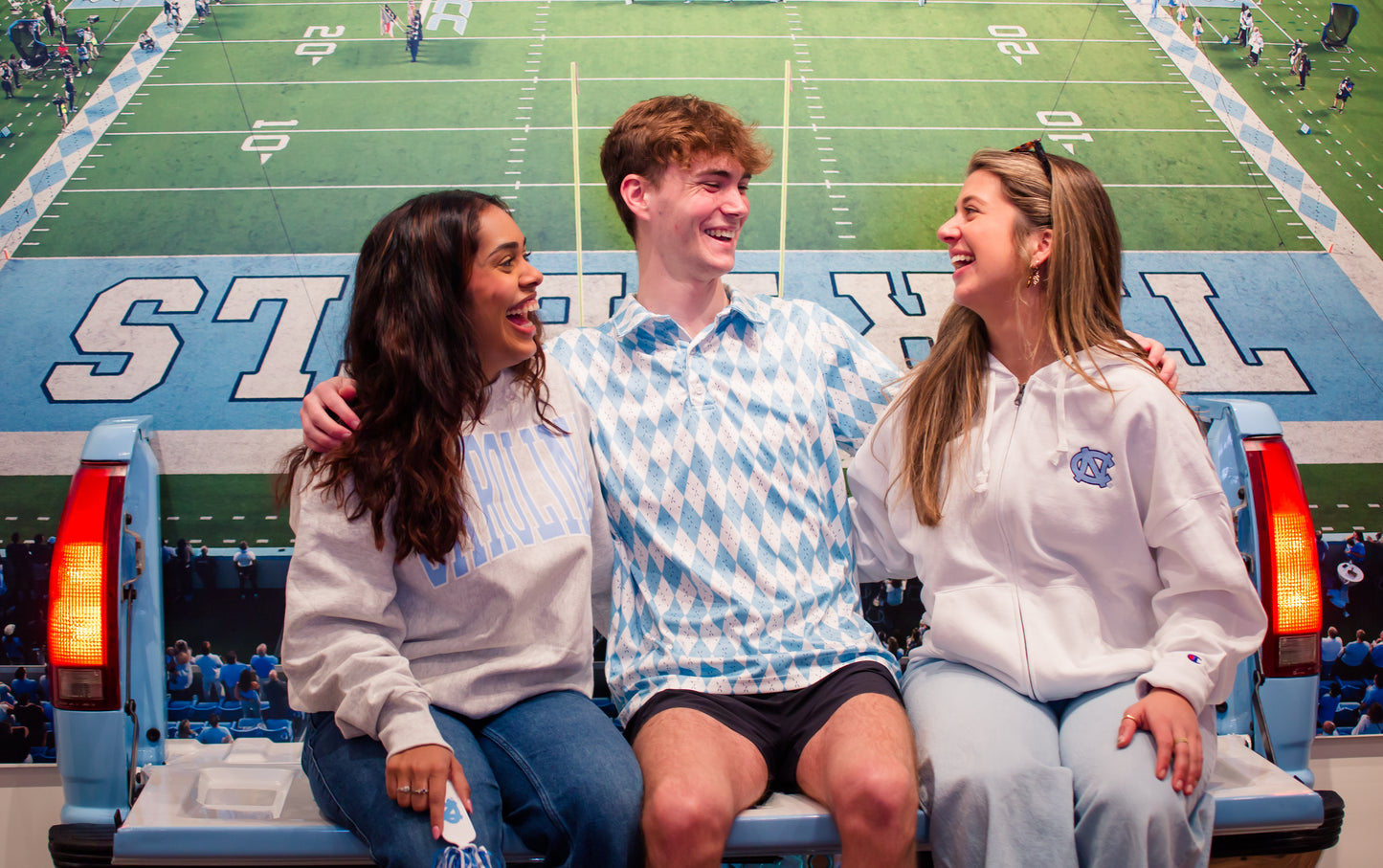 Carolina Blue and White Argyle Polo in Athletic Material