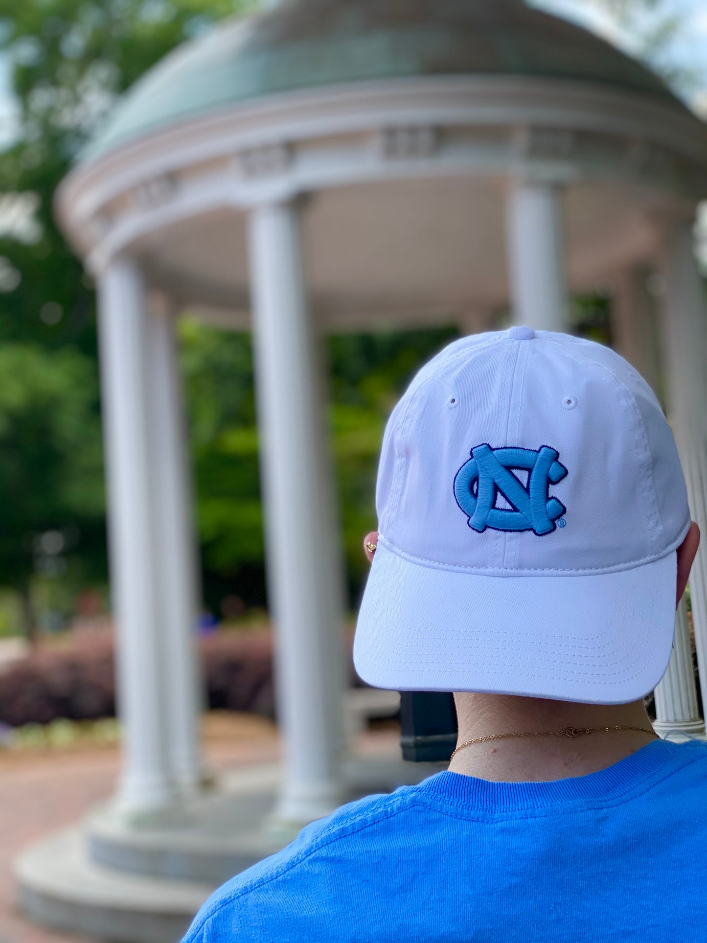 UNC Hat in Champ White Carolina Blue Logo Adjustable Back